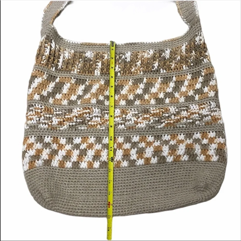Large tan and cream crocheted crossbody bag with zipper top